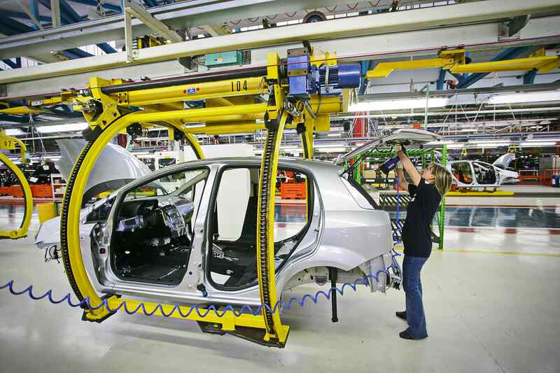 stock-photo-car-production-line-with-unfinished-cars-in-a-row-at-fca-factory-turin-italy-may-1716425092